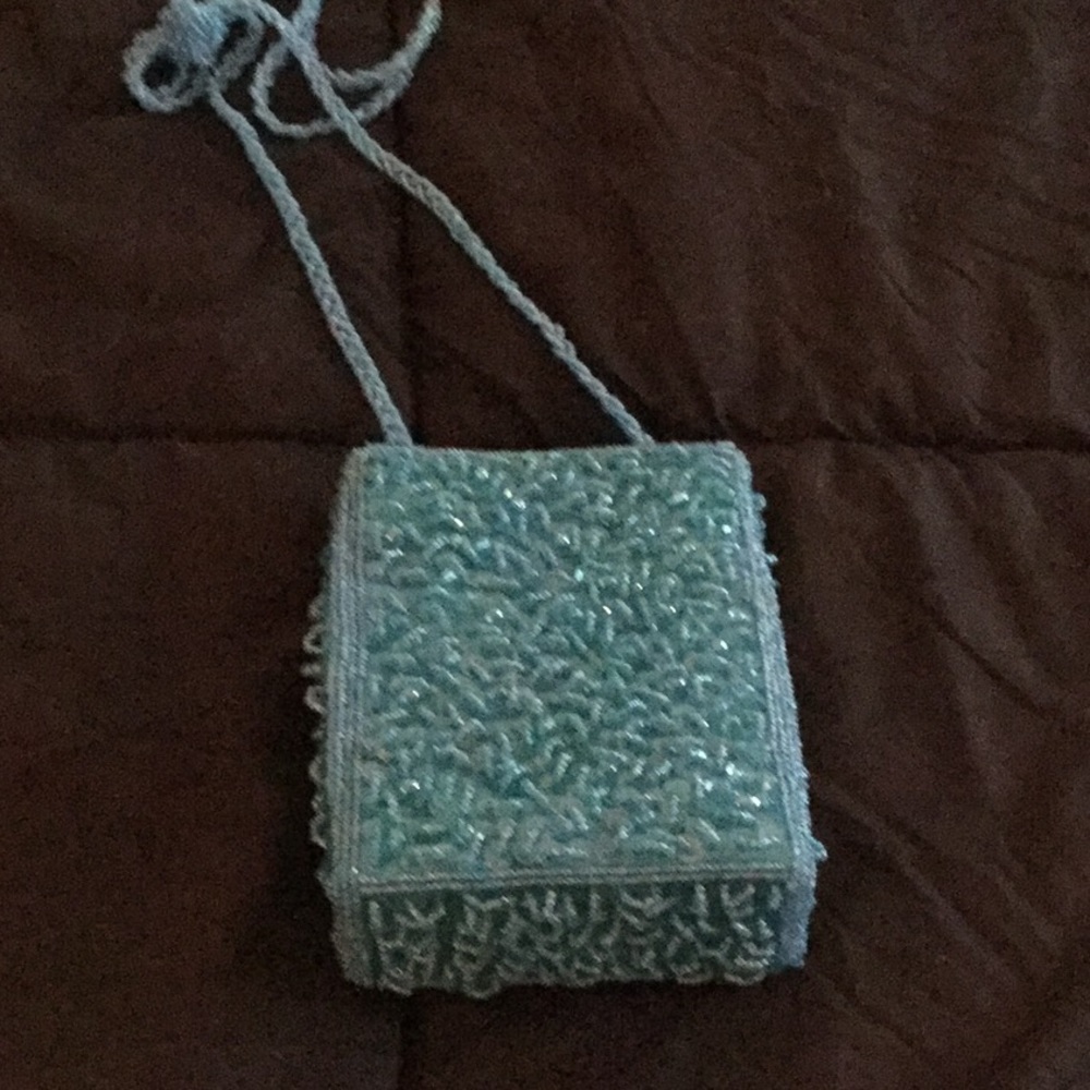 Evening Treasures beaded purse in turquoise .